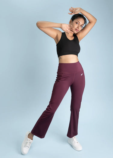 Wine flare pants for women, full-length pose