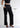 Black trousers with pintuck and deep pocket labels