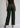 Dark olive wide leg trousers for women, back view