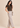 Chocolate brown pleated top with flutter sleeves, right side