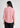 Light pink shirt-style top for women, back view