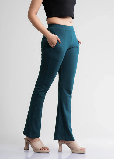 Ocean blue bootcut pants for women, angled front view