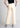 Petal cream cotton trousers, back view
