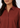 Shirt collar and placket close-up, rust top