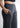 Side pocket and waistband close-up, smokey grey trousers