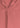 Notched collar and textured fabric close-up, sunset peach shirt