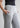 Side pocket and waistband close-up, urban grey trousers