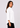 White shirt collar top, side view facing right
