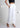 White trousers with pintuck and deep pocket labels
