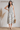 Flurr floral linen dress for women in blue botanical print, front view