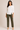 Flurr Mira asymmetric top for women in front view, modern officewear top with 3/4 sleeves and asymmetric hem