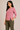 Flurr pink Mira asymmetrical top for women left side view, asymmetrical hem detail
