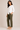 Flurr Mira asymmetric top for women in right side view, showing the asymmetric hem and relaxed tailored fit