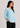 Aqua mist V-neck linen top, side view