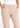 Waistband and side pocket close-up, beige straight pants
