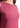 Round neck and textured fabric close-up, berry pink top