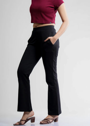 Black bootcut pants for women, side view