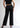 Black wide leg trousers for women, back view