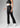 Black flare pants, side view
