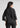 Black shirt-style top for women, back view