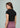 Black ribbed crop top, back view
