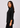 Black shirt collar top, side view facing left