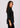 Black shirt collar top, side view facing right