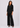 Black shirt top with black trousers, full length
