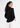Black textured top, back view over the shoulder