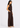 Brown sleeveless top and trousers set, side view