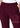Waistband pintucks and textured fabric close-up, burgundy trousers