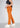 Caramel flare pants, angled front view