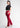 Cherry red bootcut pants, full-length view