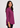 Deep raspberry shirt collar top, side view facing right