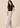 Flurr black Pearl Pleat Top with flutter sleeves left side view