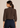 Flurr chocolate brown bow tie neck top, back view
