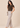 Flurr chocolate brown Pearl Pleat Top with flutter sleeves left side view