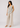 Flurr Linen Blossom floral linen top for women, full front view showing the V-neck, floral print and curved hem