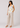 Flurr linen ivory floral top for women with V-neck and curved hem, full front view