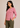 Flurr pink Mira asymmetrical top for women left side view, asymmetrical hem detail