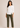Flurr Mira asymmetric top for women in front view, modern officewear top with 3/4 sleeves and asymmetric hem