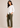 Flurr Mira asymmetric top for women in left side view, showing the asymmetric silhouette and 3/4 sleeves