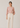 Flurr Office Crush Top in soft pink styled with cream tailored trousers, full-length outfit