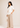 Flurr SmartFit Peplum Top in white left side view