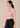 Flurr soft pink bow tie neck top, left side view
