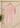 Flurr soft pink Pearl Pleat Top with flutter sleeves displayed on hanger