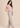 Flurr soft pink Pearl Pleat Top with flutter sleeves right side view