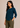 Flurr teal blue asymmetric top left side view for women’s officewear