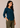 Flurr teal blue asymmetric top right side view for women’s officewear