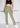 Golden olive flare pants, with feature labels